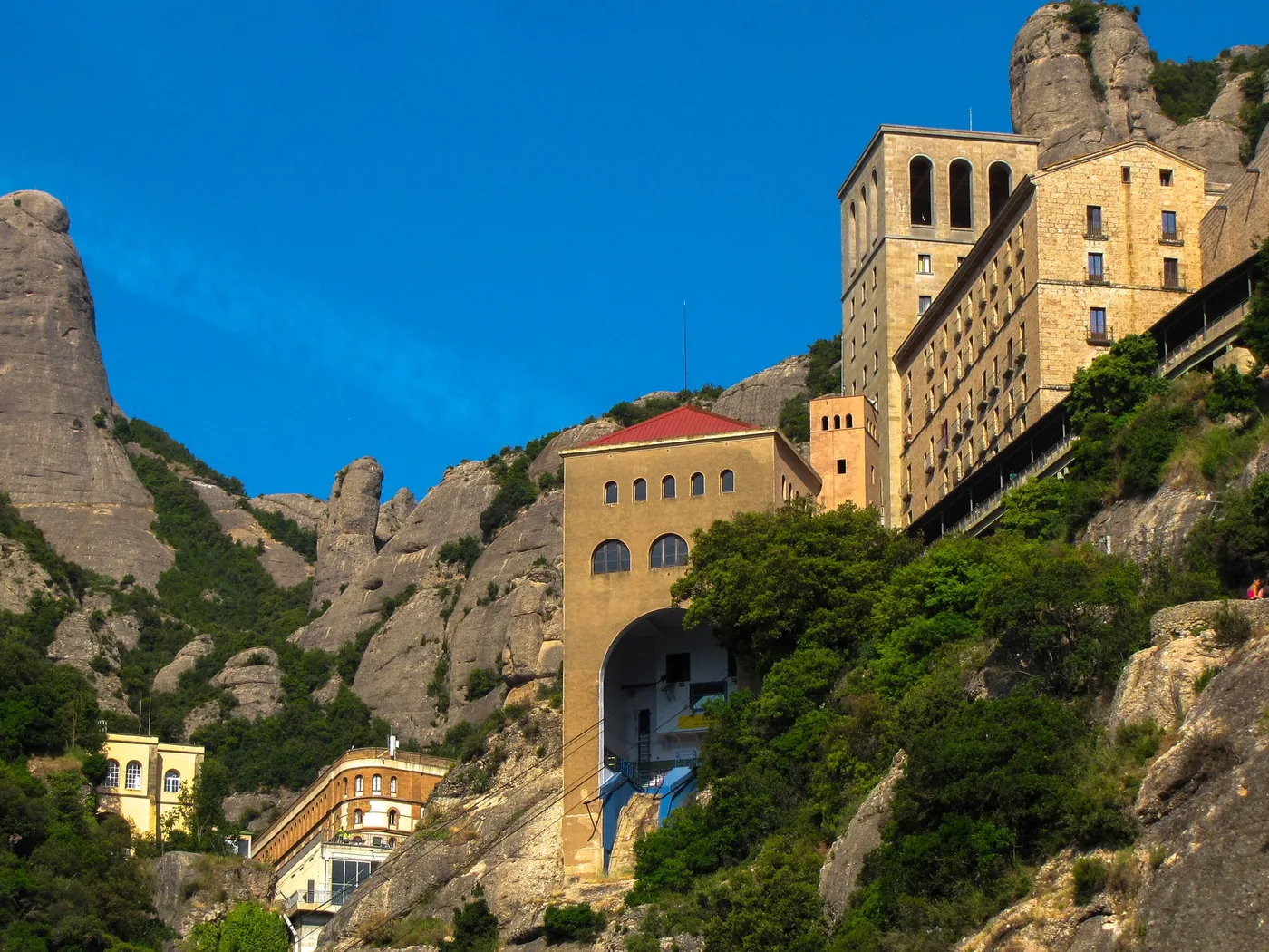 The Benedictine monastery of Santa Maria de Montserrat built into the mountainside
